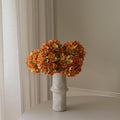 Muted Orange Hydrangea Bouquet Met Large Earth